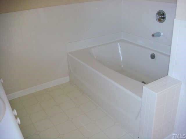 5905 Forest Ridge Drive Durham, NC 27713 - Photo 9 of 12 Relaxation will be yours in your large garden tub.