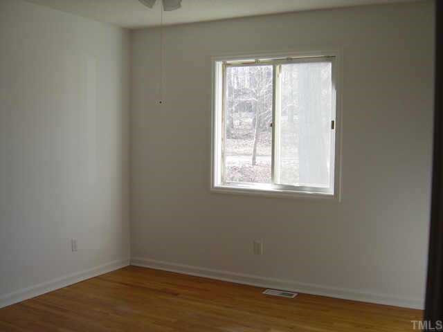 1906 Medfield Road Raleigh, NC 27607 - Photo 10 of 12 Lots of light in this front bedroom. Both 2nd and 3rd bedrooms have hardwood floors Other