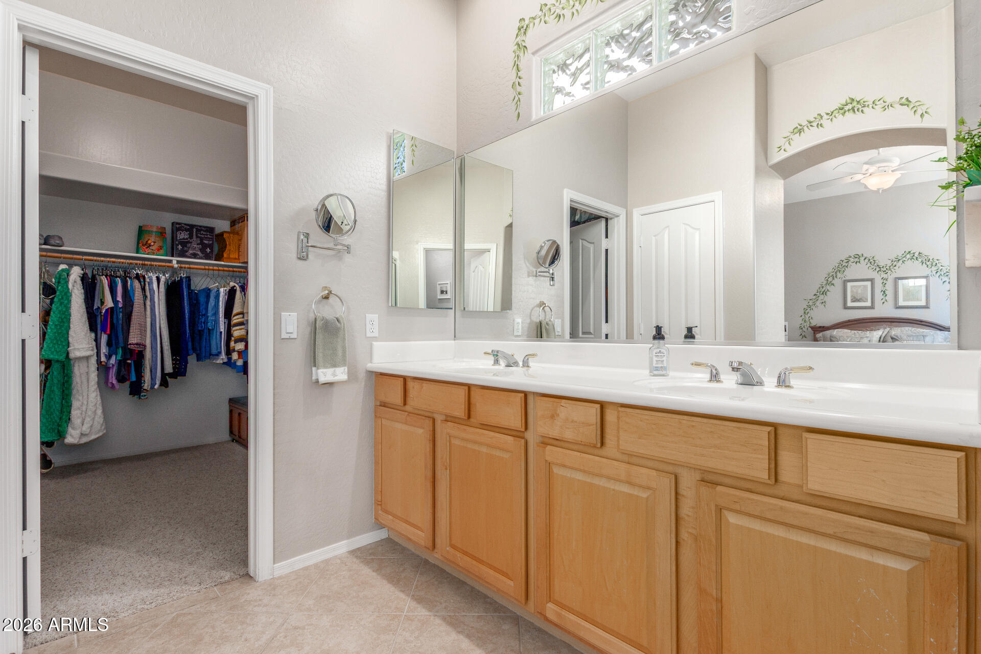 3553 East Washington Avenue Gilbert, AZ 85234 - Photo 17 of 30 a bathroom with a sink and a mirror
