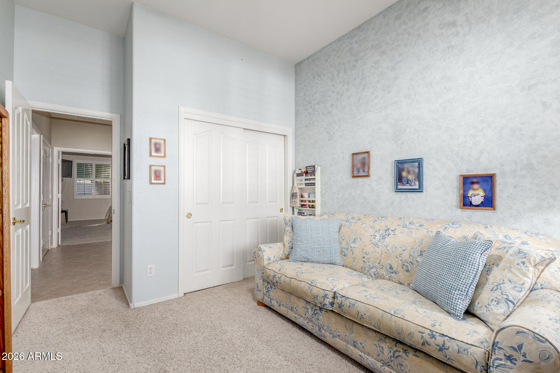 3553 East Washington Avenue Gilbert, AZ 85234 - Photo 23 of 30 a living room with furniture and a couch
