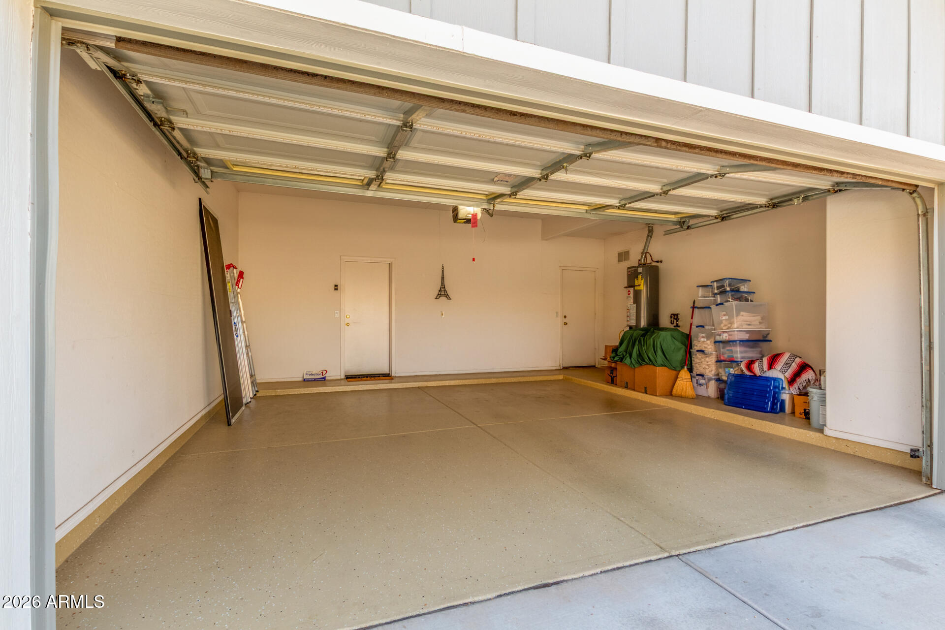 3553 East Washington Avenue Gilbert, AZ 85234 - Photo 26 of 30 a view of a garage with rack and bicycle