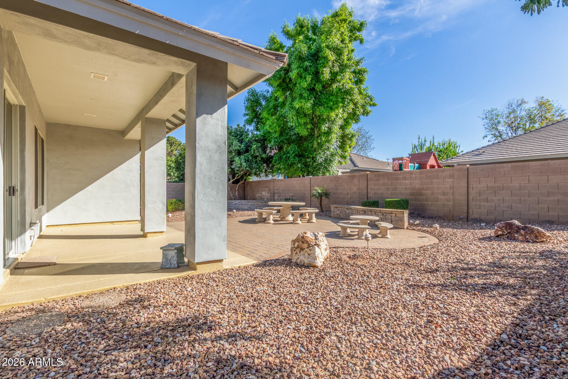 3553 East Washington Avenue Gilbert, AZ 85234 - Photo 28 of 30 a view of a backyard with sitting area and furniture