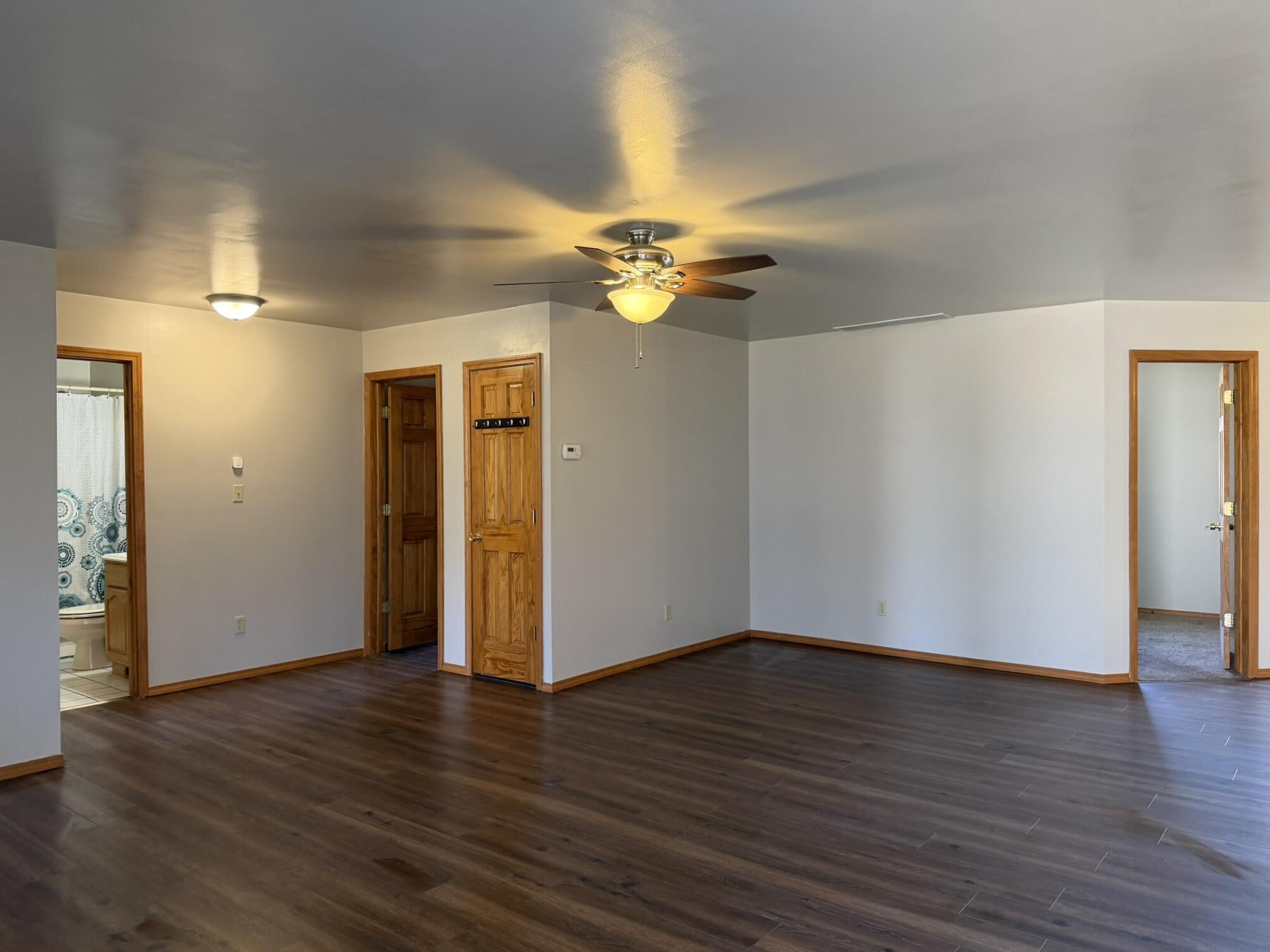 9103 Estates Drive Demotte, IN 46310 - Photo 12 of 35 a view of an empty room with wooden floor