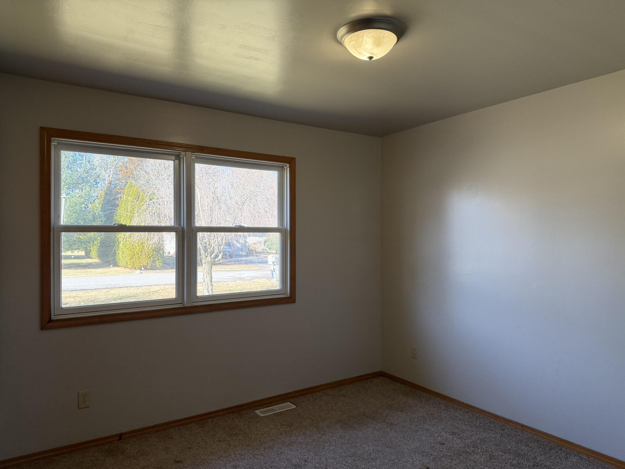 9103 Estates Drive Demotte, IN 46310 - Photo 30 of 35 an empty room with a window