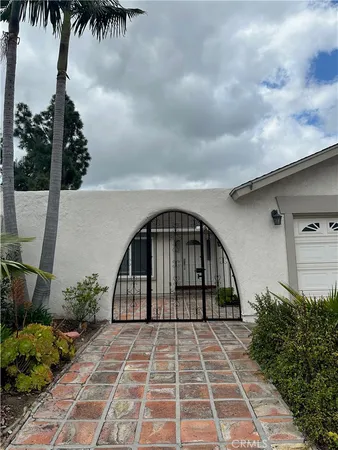 a house with trees in the background