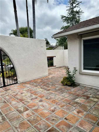 a view of a backyard of a house