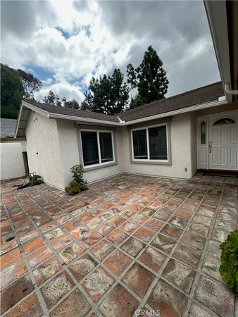 a view of entryway with a front door