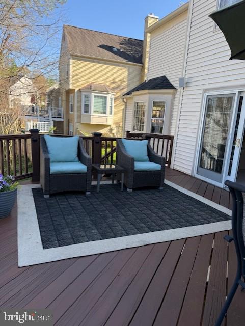 7801 Blue Jasmine Court Springfield, VA 22153 - Photo 59 of 61 a view of a roof deck with couches