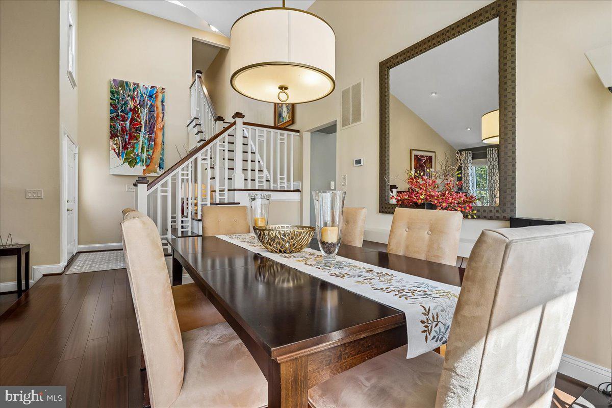 7801 Blue Jasmine Court Springfield, VA 22153 - Photo 10 of 61 a view of a living room and dining room