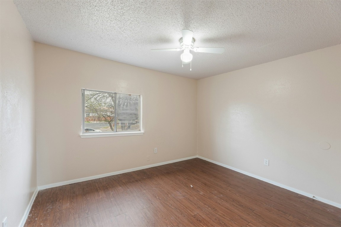 8412 Garcreek Circle Austin, TX 78724 - Photo 18 of 40 The bedrooms come with updated vinyl plank flooring, ceiling fans, and closet storage.