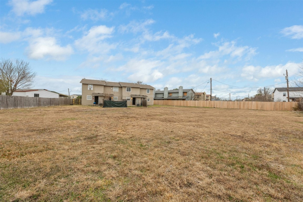 8412 Garcreek Circle Austin, TX 78724 - Photo 3 of 40 This massive yard behind the units is currently fenced in making it desirable for current renters, while providing an abundance of space for additional future development.