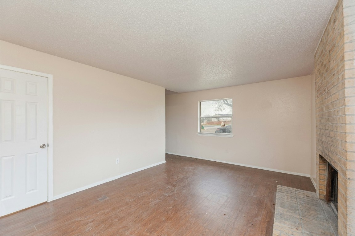 8412 Garcreek Circle Austin, TX 78724 - Photo 8 of 40 Inside Unit A, the entryway flows into the spacious main living area.