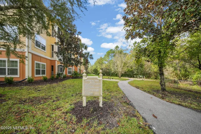 a view of a building with a garden