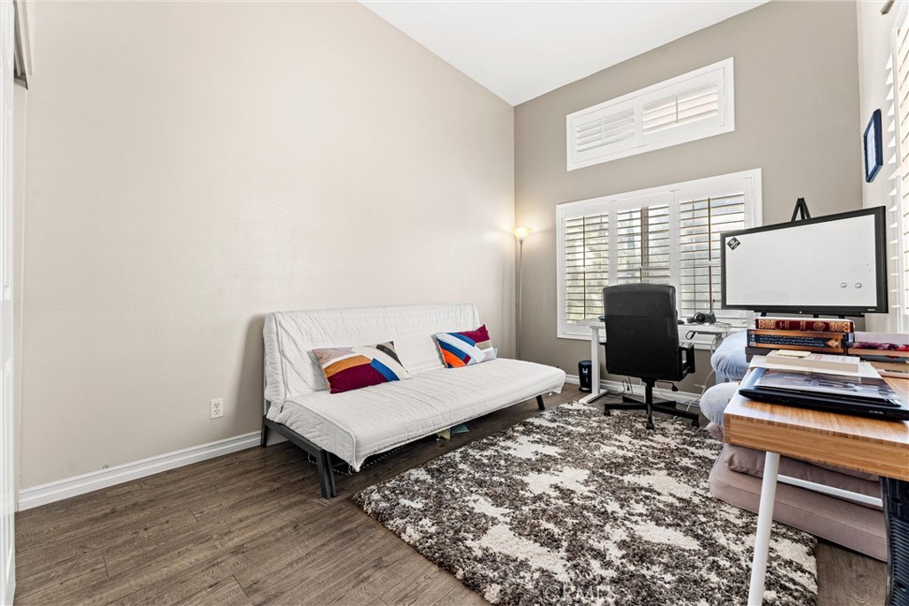 8705 Running Springs Drive Anaheim, CA 92808 - Photo 17 of 37 a living room with furniture and a flat screen tv