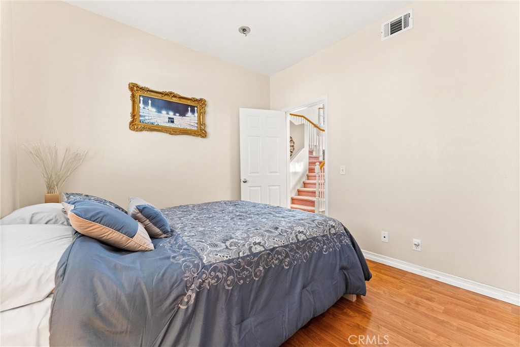 8705 Running Springs Drive Anaheim, CA 92808 - Photo 20 of 37 a bedroom with a bed and a window