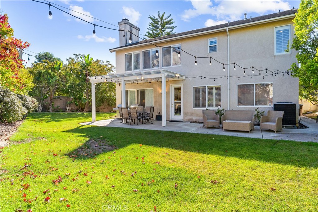 8705 Running Springs Drive Anaheim, CA 92808 - Photo 24 of 37 a view of a house with swimming pool yard and patio
