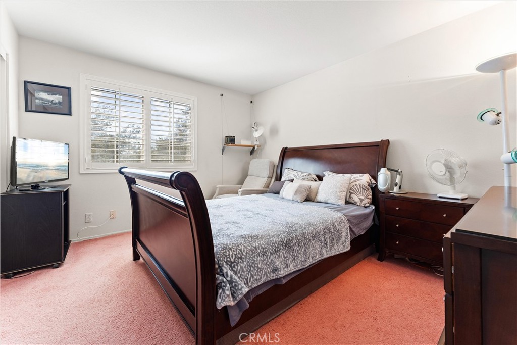 8705 Running Springs Drive Anaheim, CA 92808 - Photo 33 of 37 a bed room with a bed and a chair