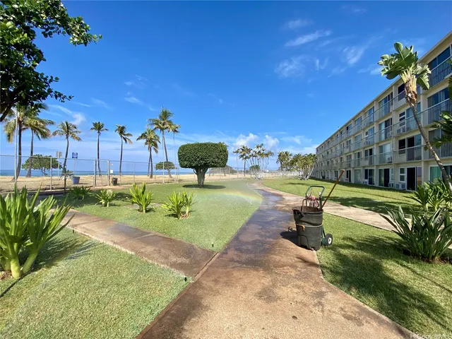 a garden view with a seating space