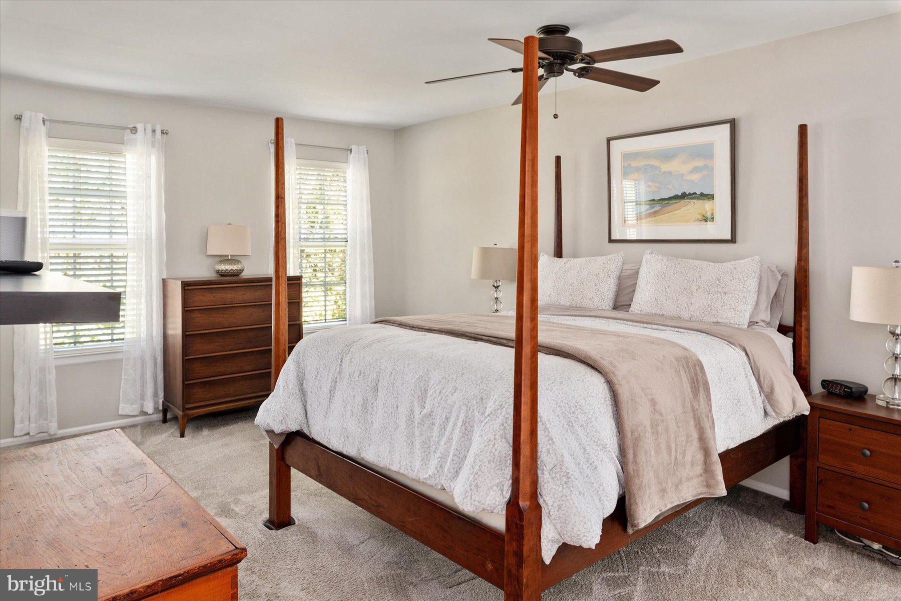 9337 Spring Water Path Jessup, MD 20794 - Photo 16 of 41 a bedroom with a bed and a dresser
