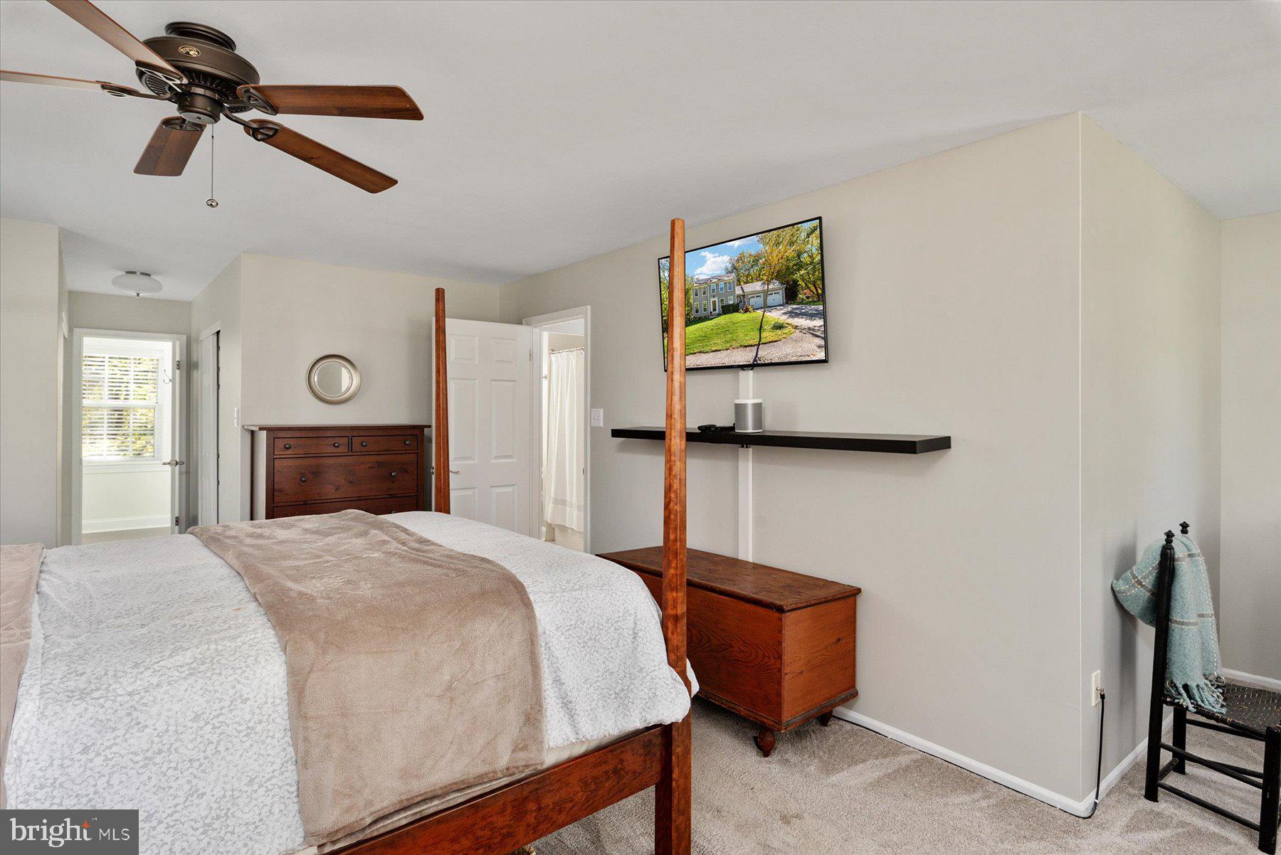 9337 Spring Water Path Jessup, MD 20794 - Photo 17 of 41 a bedroom with a bed dresser and a window