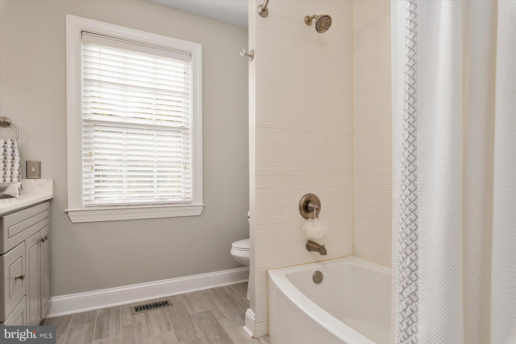 9337 Spring Water Path Jessup, MD 20794 - Photo 23 of 41 a bathroom with a bathtub