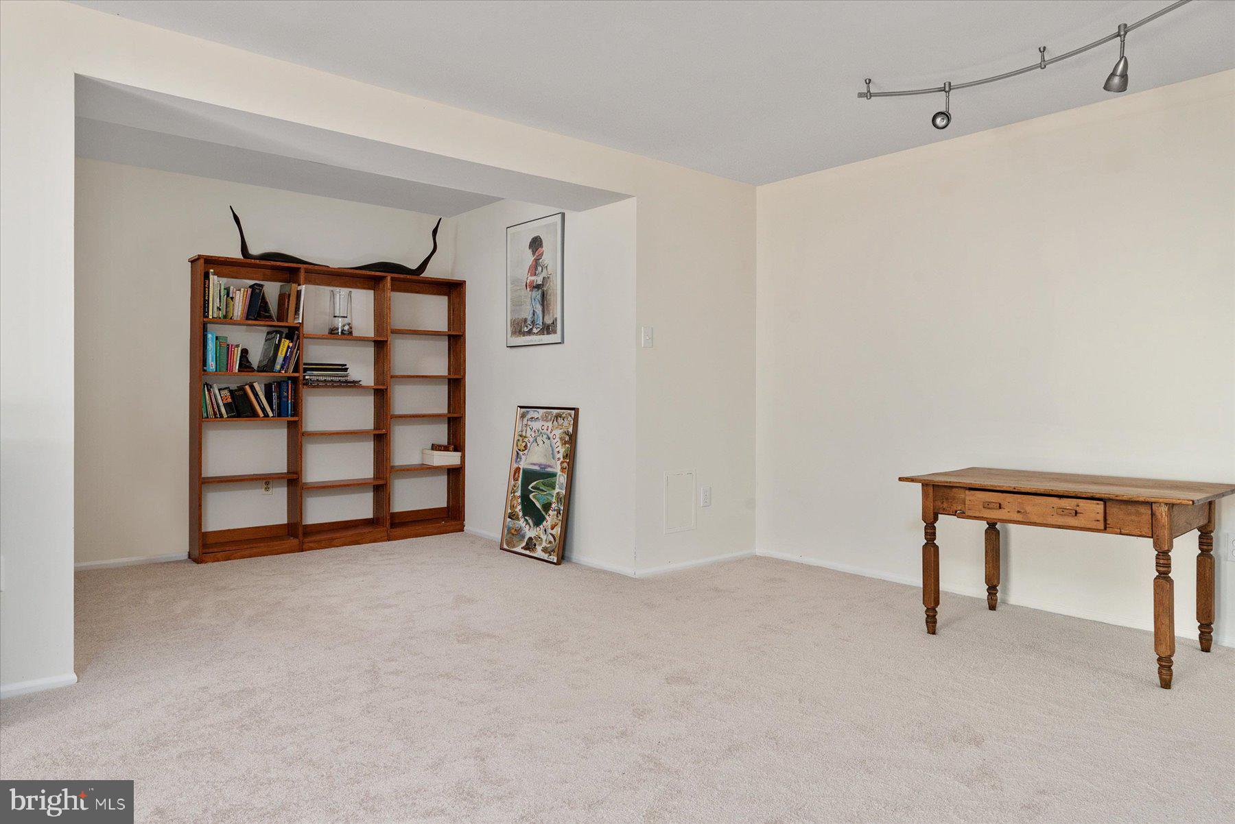 9337 Spring Water Path Jessup, MD 20794 - Photo 28 of 41 a view of an empty room with a cabinet