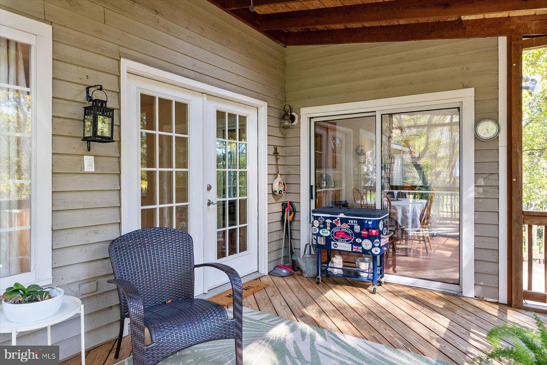 9337 Spring Water Path Jessup, MD 20794 - Photo 40 of 41 a living room filled with furniture and a potted plant