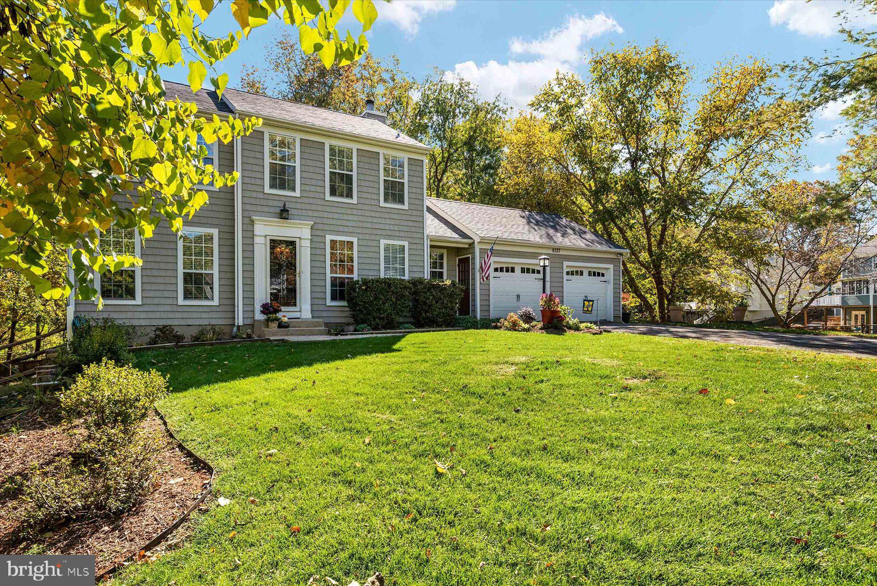 9337 Spring Water Path Jessup, MD 20794 - Photo 41 of 41 a front view of a house with yard and green space