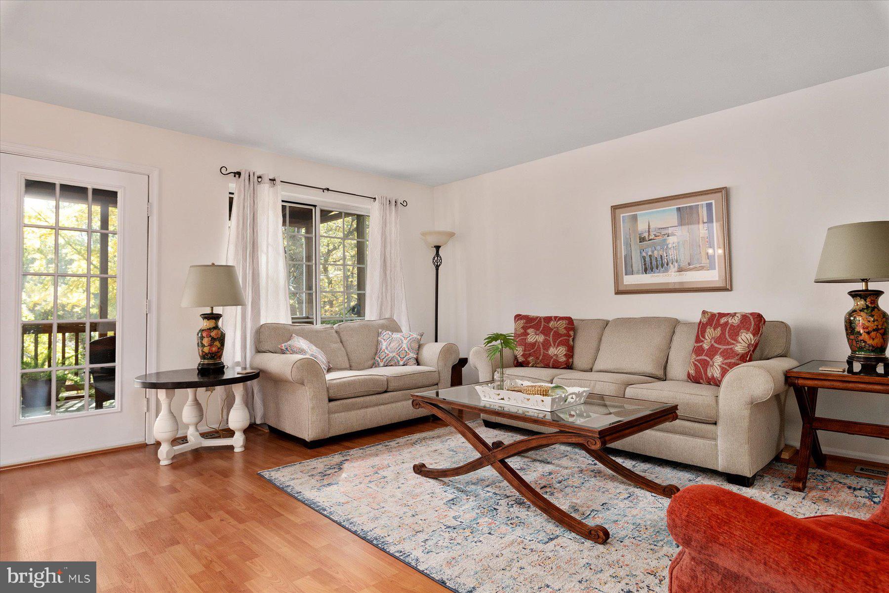 9337 Spring Water Path Jessup, MD 20794 - Photo 6 of 41 a living room with furniture and a large window