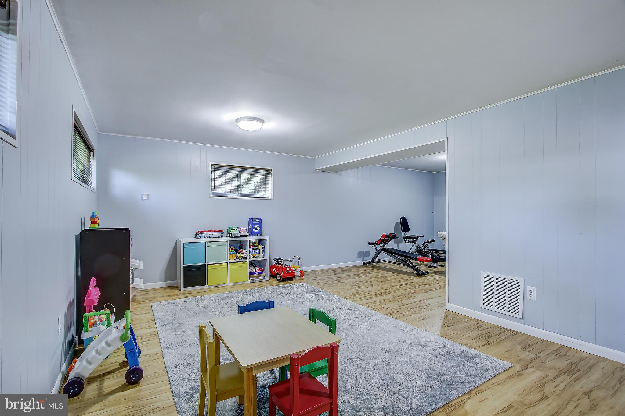 11626 Le Baron Terrace Silver Spring, MD 20902 - Photo 21 of 30 'L-shaped' main lower level area.