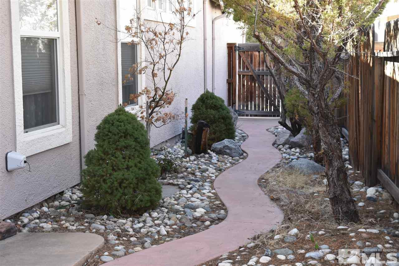1186 Scenic Park Terrace Reno, NV 89521 - Photo 2 of 18 a front view of a house with a yard