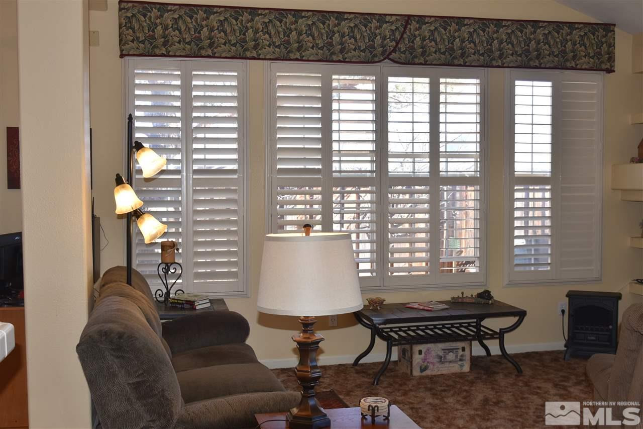 1186 Scenic Park Terrace Reno, NV 89521 - Photo 4 of 18 a living room with furniture and a window