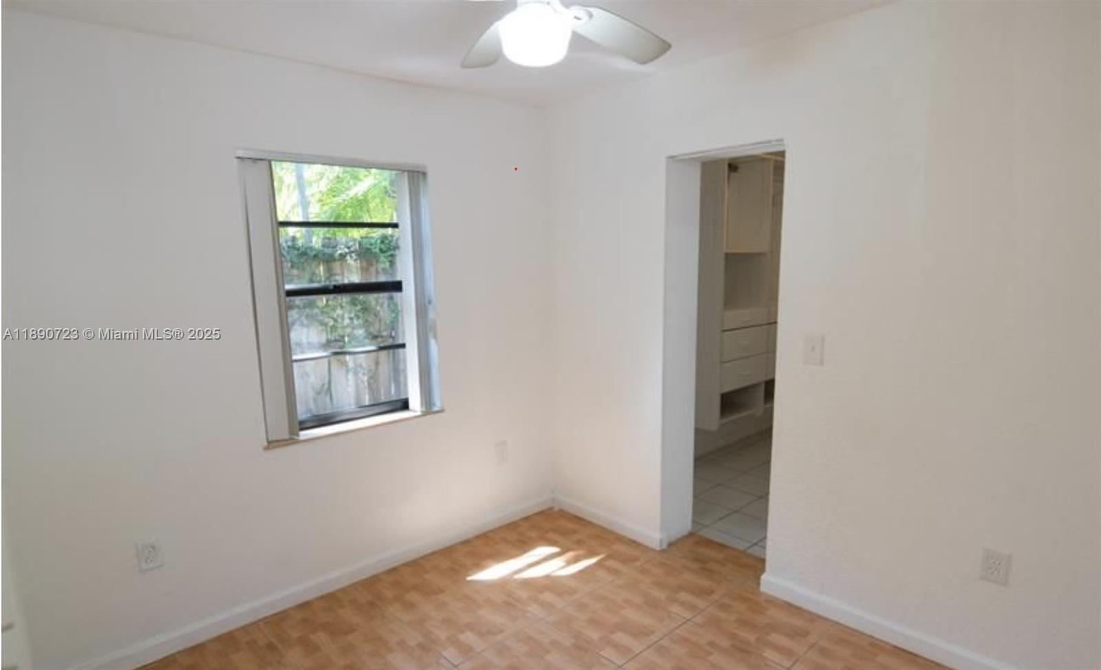 3050 Alton Road Miami Beach, FL 33140 - Photo 39 of 41 an empty room that has a window