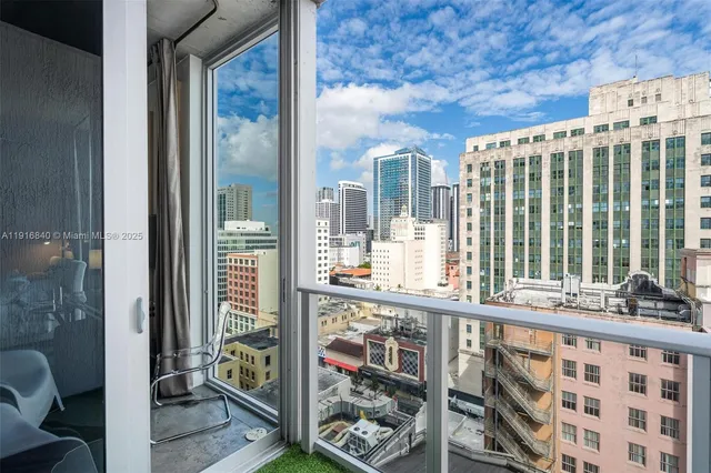 a view of a balcony with wooden floor