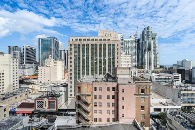 a view of city with tall buildings