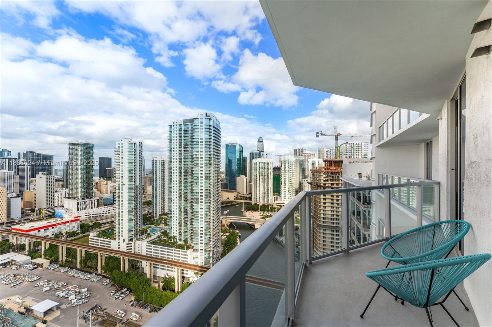 185 Southwest 7th Street, Unit 3605 Miami, FL 33130 - Photo 21 of 24 a view of a balcony with furniture