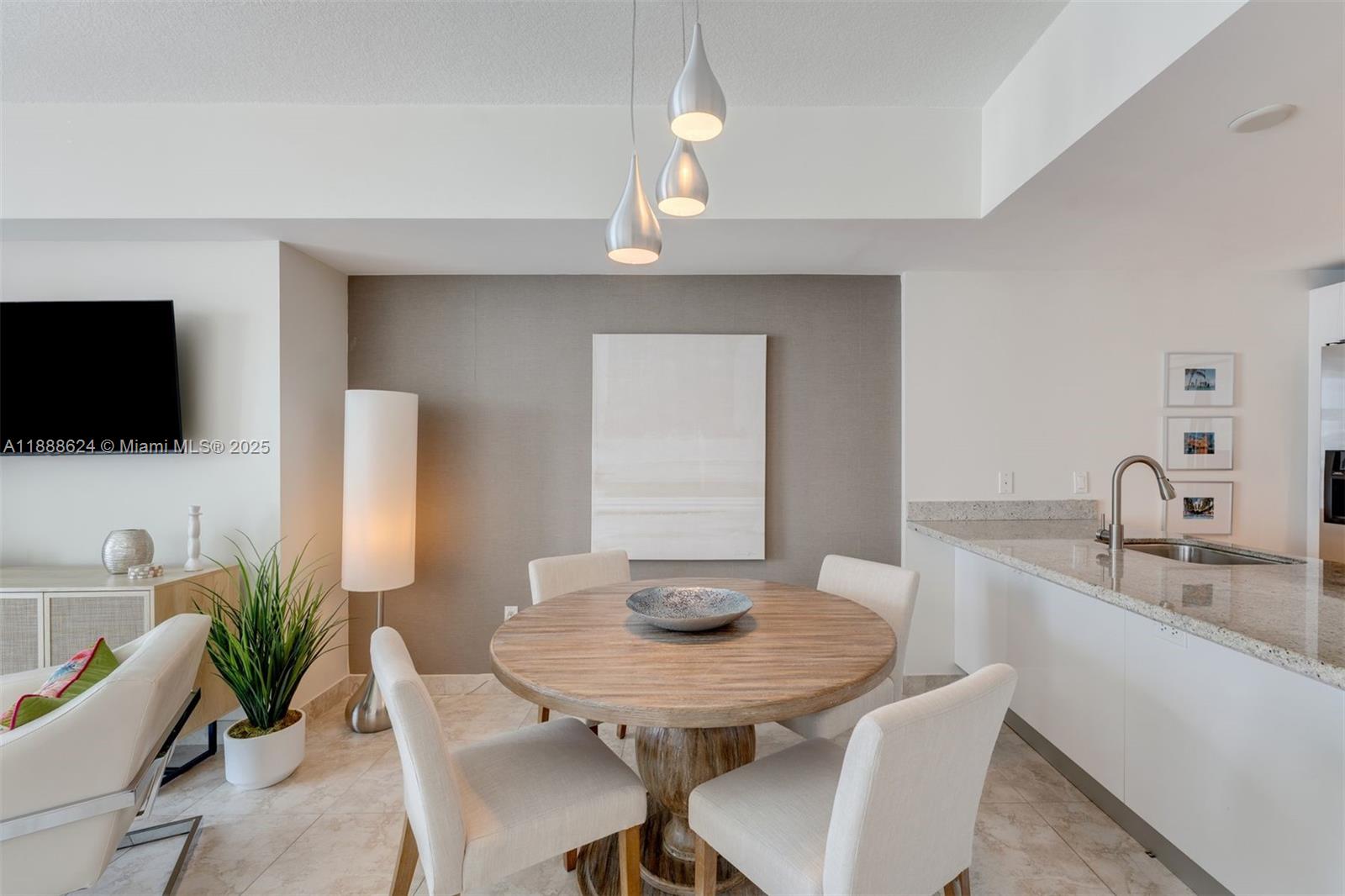 185 Southwest 7th Street, Unit 3605 Miami, FL 33130 - Photo 10 of 24 a view of a dining room with furniture