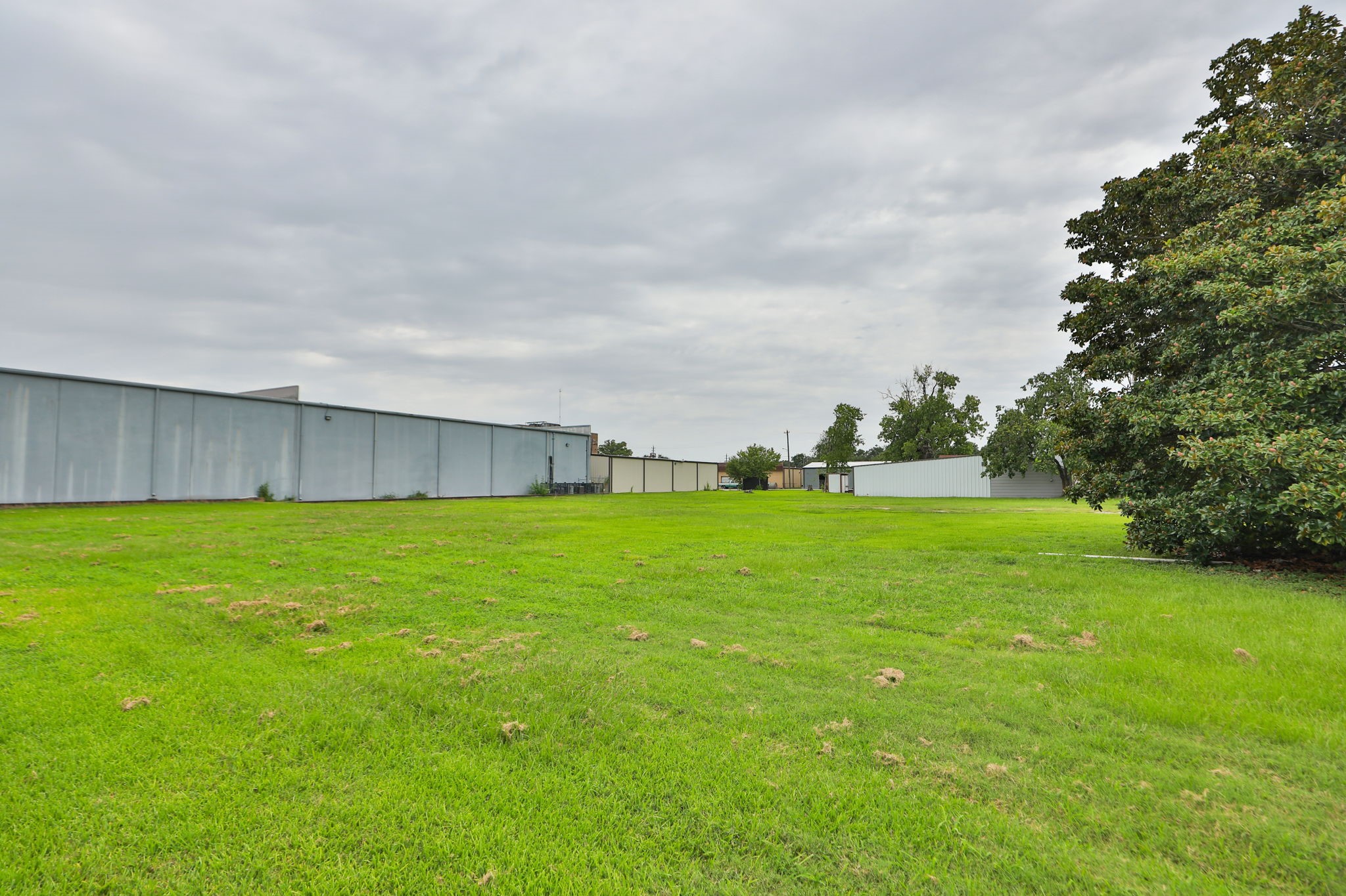 14023 Packard Street Houston, TX 77040 - Photo 18 of 33 a view of a backyard with a garden