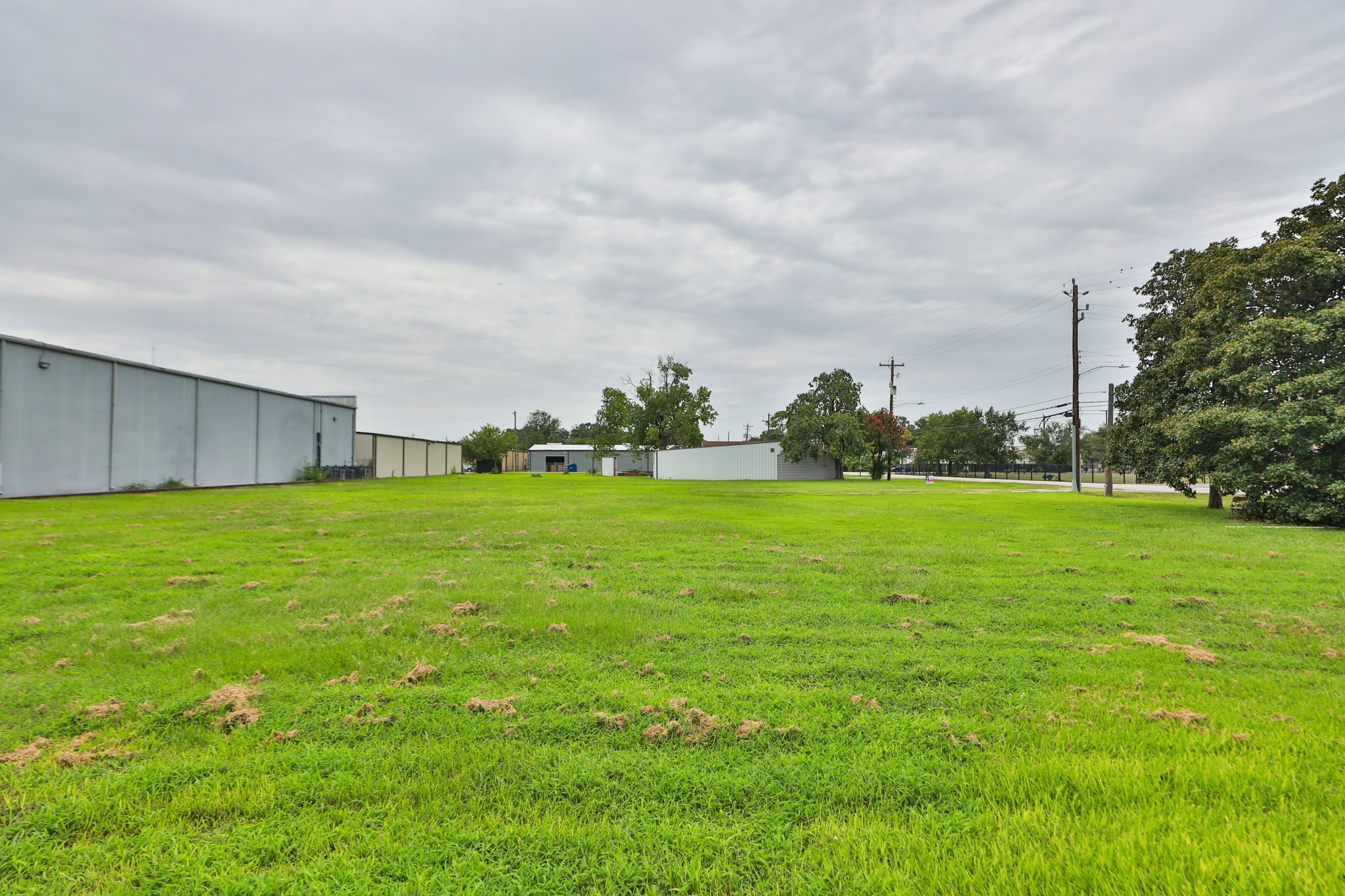 14023 Packard Street Houston, TX 77040 - Photo 19 of 33 a backyard of a house with lots of green space