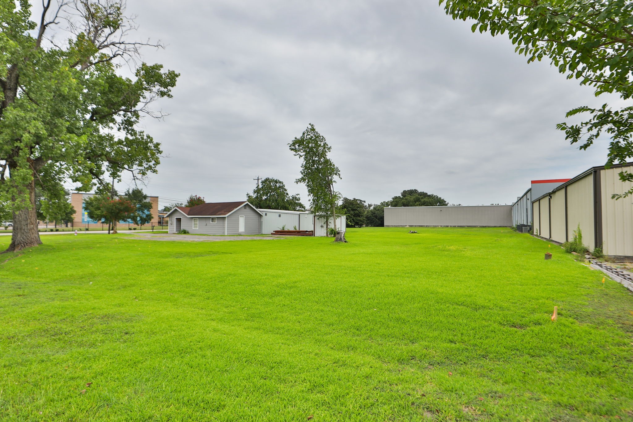 14023 Packard Street Houston, TX 77040 - Photo 23 of 33 a front view of a house with garden