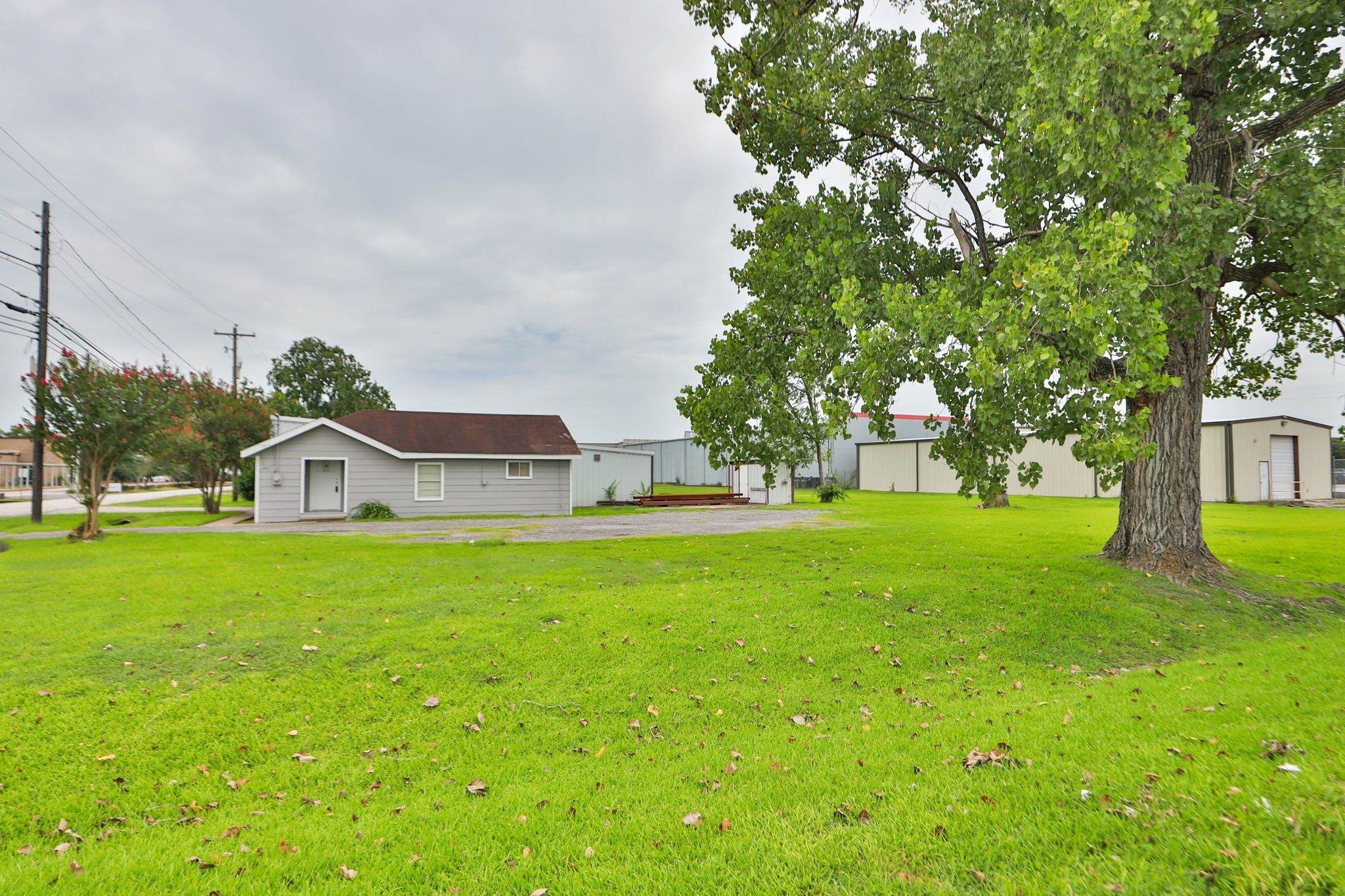 14023 Packard Street Houston, TX 77040 - Photo 25 of 33 a front view of a house with garden