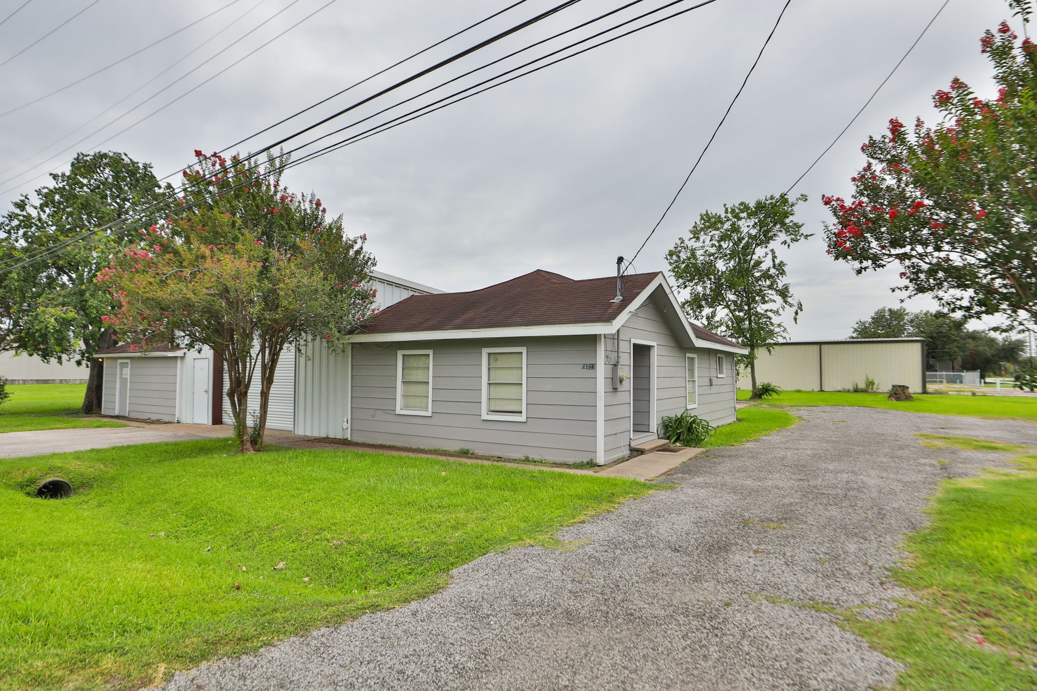 14023 Packard Street Houston, TX 77040 - Photo 28 of 33 a view of a house with a yard and large tree