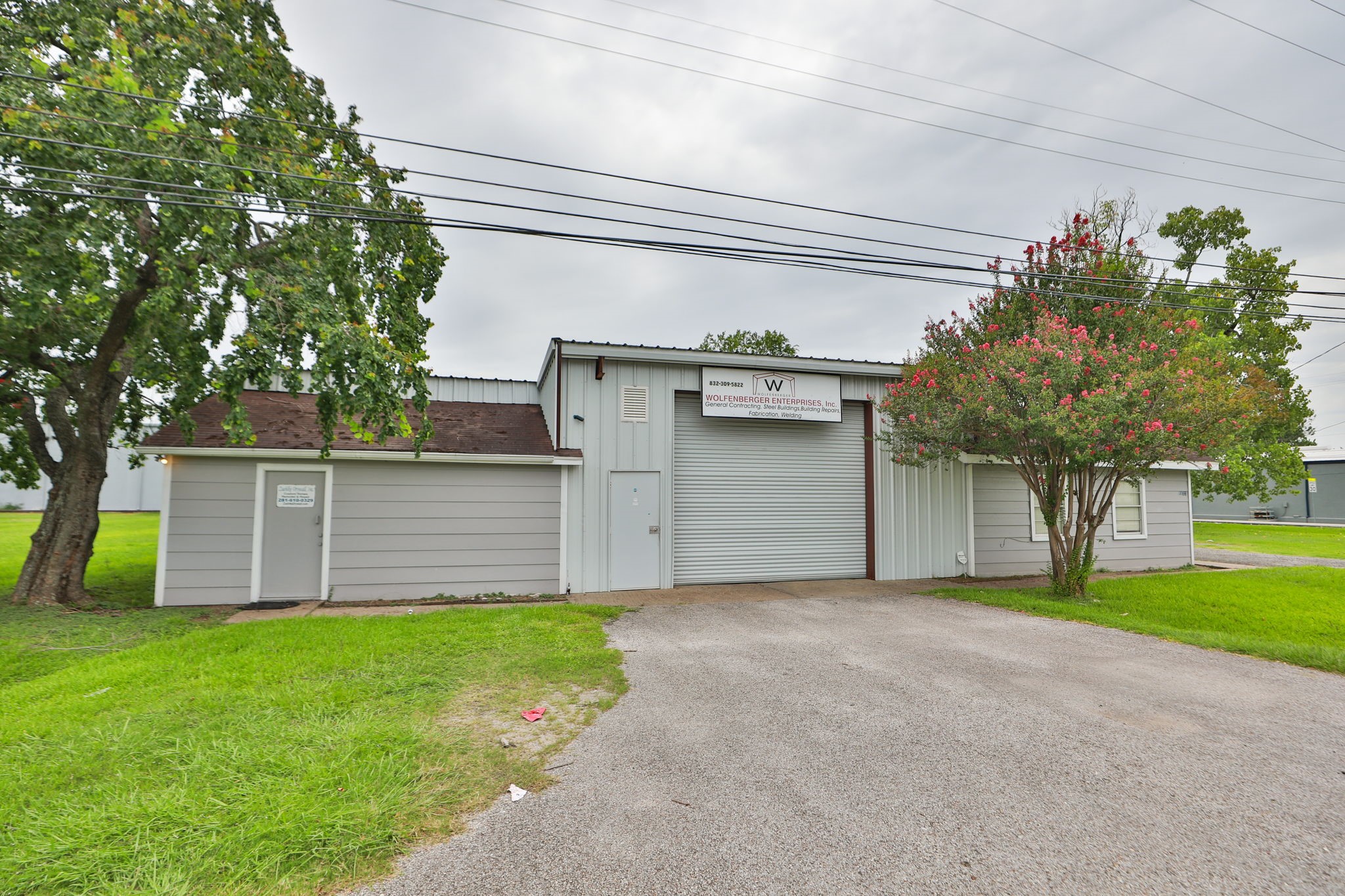 14023 Packard Street Houston, TX 77040 - Photo 31 of 33 a front view of house with yard and green space
