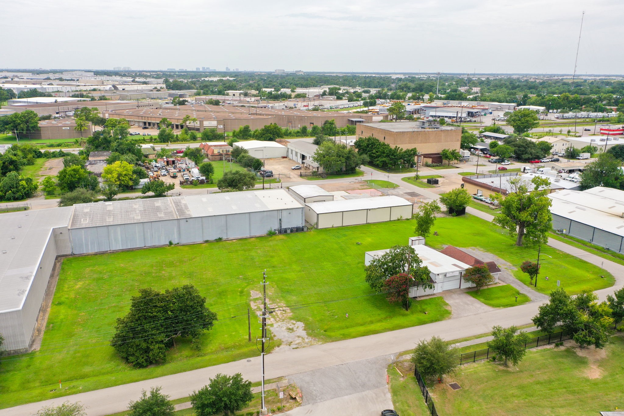 14023 Packard Street Houston, TX 77040 - Photo 4 of 33 an aerial view of a residential houses with outdoor space and trees