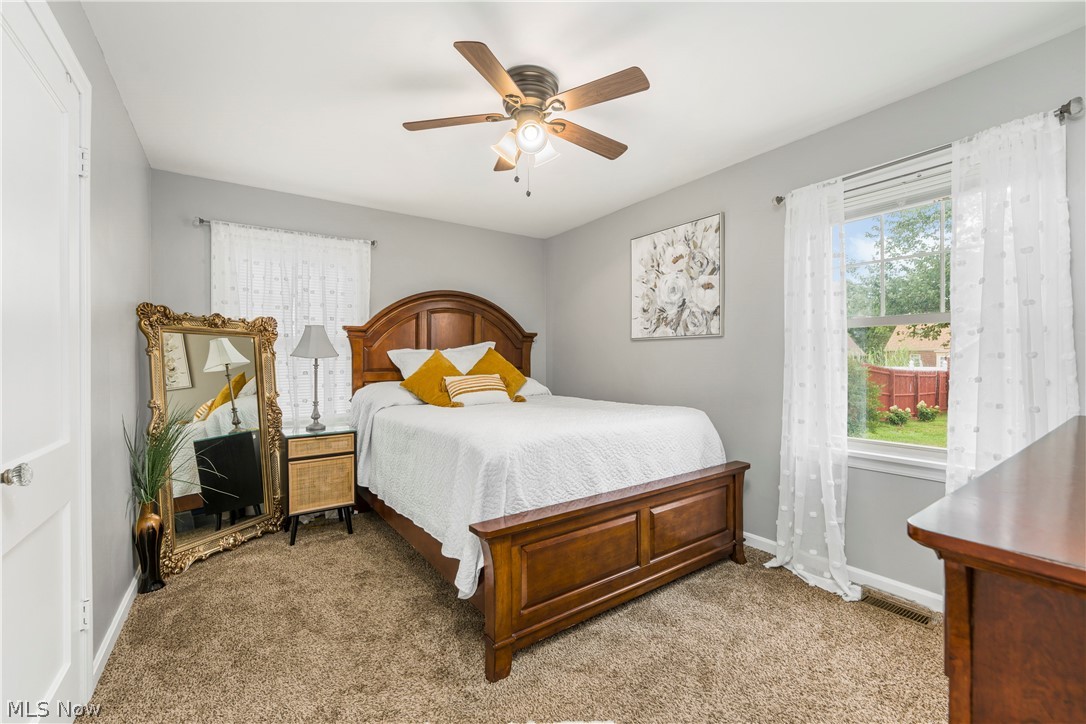 322 Valleyview Avenue Northwest Canton, OH 44708 - Photo 16 of 35 Bedroom featuring light carpet and ceiling fan