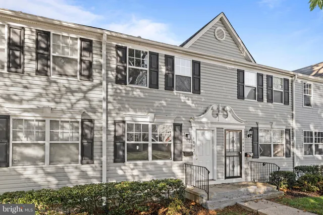 a front view of a building with a glass door