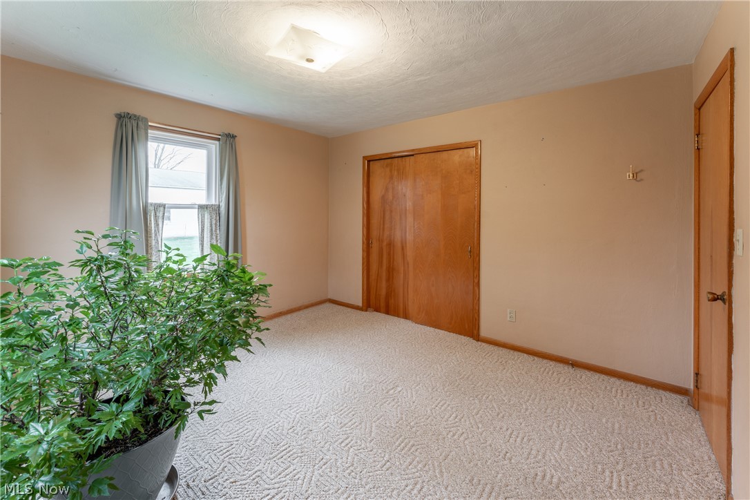 4833 Angling Road Wooster, OH 44691 - Photo 24 of 49 View of carpeted empty room
