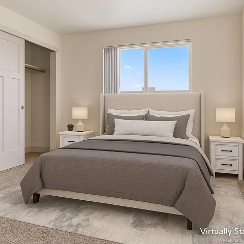 an empty room with windows and closet