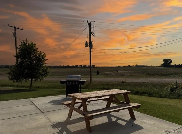 a view of a patio with chairs