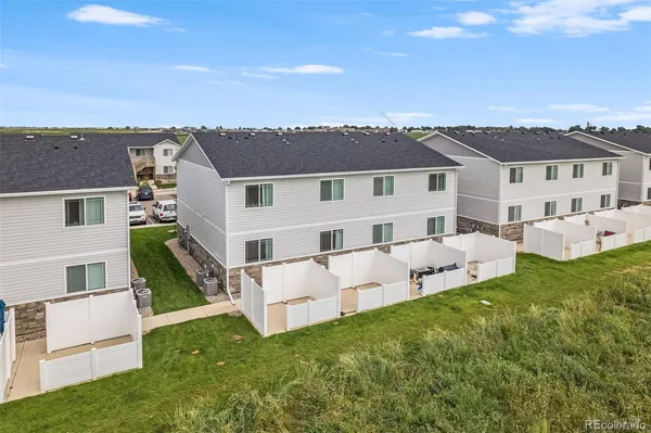 a view of an ocean and city